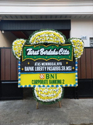 Papan Bunga Duka di Tuak Daun Merah