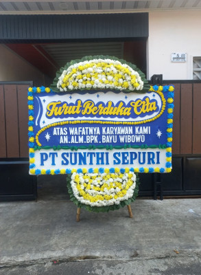 Papan Bunga Duka di Tuak Daun Merah