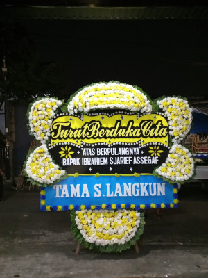 Papan Bunga Duka di Tuak Daun Merah