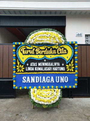 Papan Bunga Duka di Tuak Daun Merah