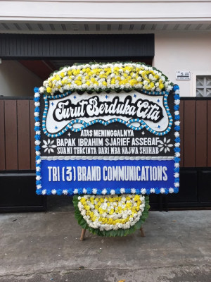 Papan Bunga Duka di Tuak Daun Merah